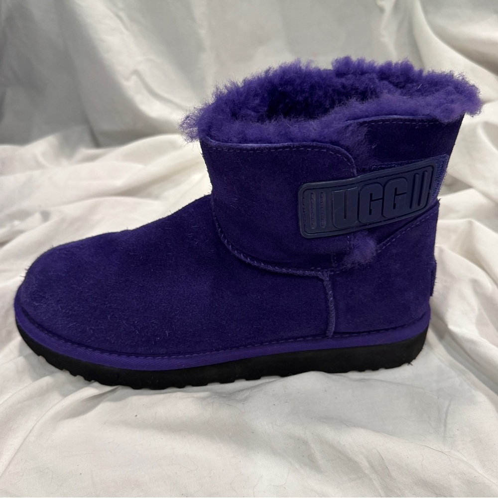 NWOT UGG Mini Bailey Logo Strap boot in violet night purple suede.